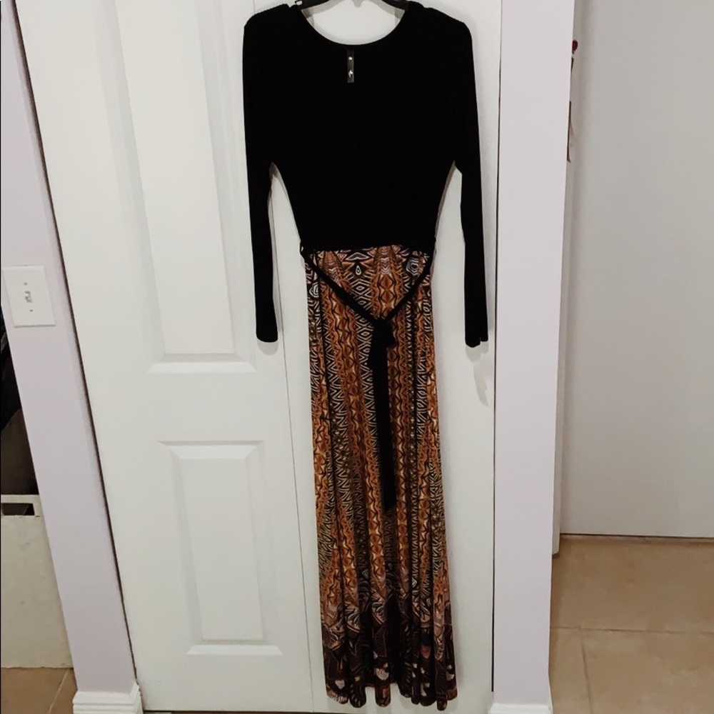 Tua Wrap Maxi  Black dress with designs and belt